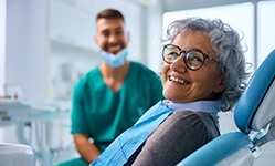 Woman smiling during dental exam