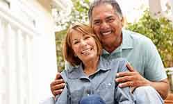 A senior couple relaxing in a garden setting